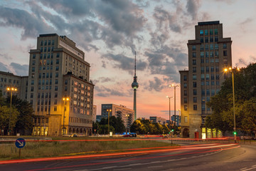 Strausberger Platz in Berlin after sunset wiht the Television Tower in the back