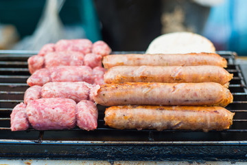 grill sour pork and Thai sausage on stove