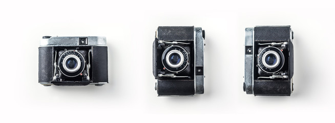 Top view of vintage cameras on white background desk for mockup, collection of diverse angle.