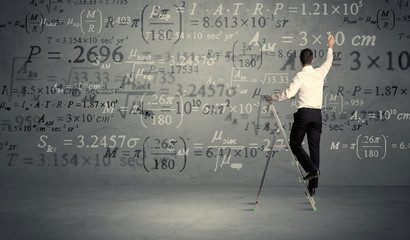 Man calculating from ladder © ra2 studio