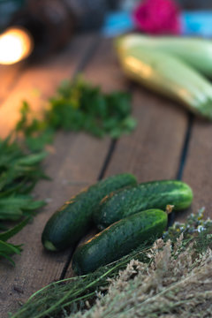 Fresh cucumber from the garden on a wooden background.