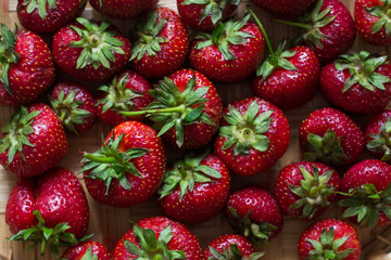 Berries strawberries with leaves healthy natural texture background.