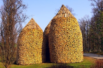 Pyramid Shaped Stacks of Firewood 