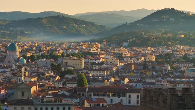 fiesole hill at sunrise seen from florence city