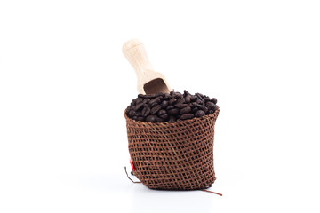 coffee bean in brown sack on white