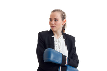 Portrait of sexual young girl in a black jacket and boxing gloves