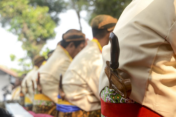 Abdi dalem wearing keris