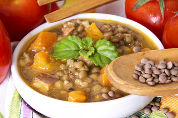 Lentil stew with wooden spoon