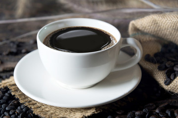Coffee cup and beans