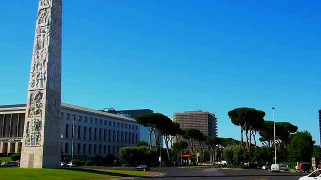 Traffic around an obelisk in Rome, Piazza Marconi, Eud district