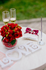 Fototapeta na wymiar A table near the wedding arch. Wedding decoration.