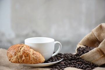 White coffee cup and coffee bean 