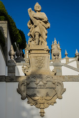 Obraz premium Imposing Good Jesus of the Mount (Bom Jesus do Monte, from 1373) Portuguese sanctuary outside city of Braga. It is an important tourist attraction of Braga. Baroque stairway that climbs 116 meters.
