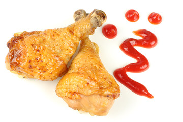 Grilled chicken leg with ketchup isolated on white background