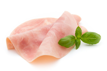 Thin slices of ham on white background.