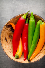 Chilli pepper on the grey background.