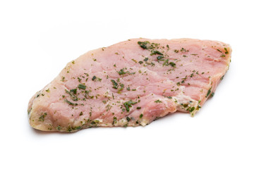 Steak with spices isolated on white background.