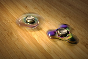 Two fidget spinner in motion