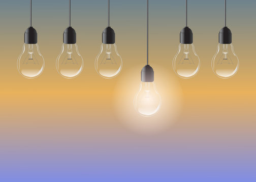 Light bulb on color background. Realistic 