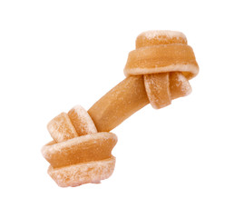 Artificial a bone for a dog with vitamins on white background