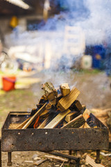 Grill with wood jar before it's ready for cooking