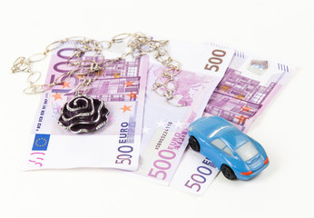 500 Euro bank notes, car and jewelry