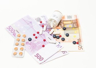 Fototapeta na wymiar Money and medical pills
