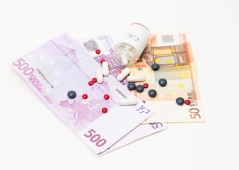 Fototapeta na wymiar Money and medical pills
