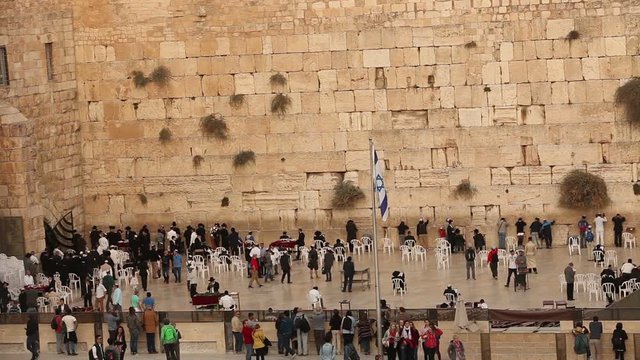 Jerusalem, Western Wall, people in the area, a lot of people, people pray at the stone wall, wailing wall, Israel flag, religion, top shooting, view from above, nice weather