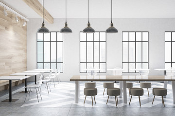 Cafe with tables, round chairs, shelves side