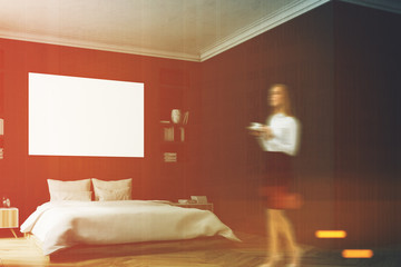 Black bedroom interior, woman, wall