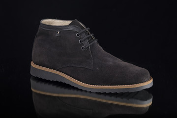 Male Black Boot on Black Background, Isolated Product, Top View, Studio.