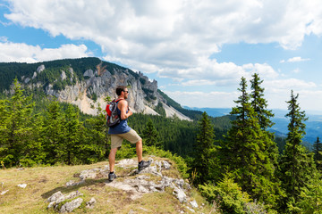 Fototapeta na wymiar Male hiker on mountain top