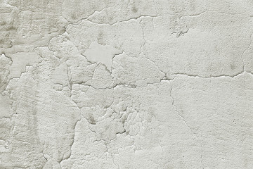 Old cracked grey wall background texture