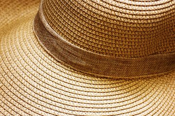 Fototapeta na wymiar Straw hat close-up holiday background