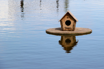 Duck house on the lake. photo