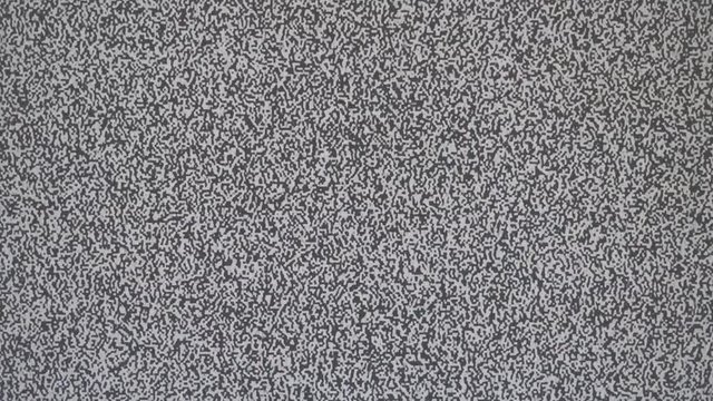 TV screen no signal, static noise and TV static fill the screen. UltraHD stock footage.