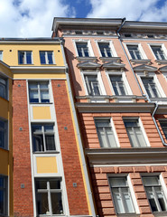 Fototapeta na wymiar Facades of Colorful buildings typically found in Scandinavian architecture, Helsinki Finland