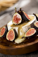 Warm Brie Cheese Topped with Figs and Honey