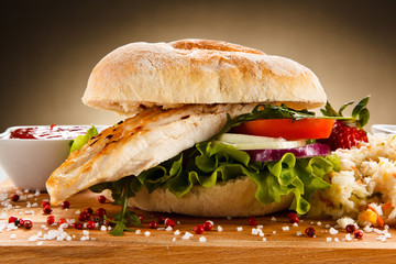 Sandwich with chicken fillet and fried egg 
