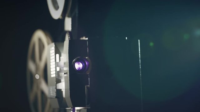 Old film projector start working in dark space
