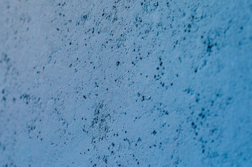 Blue plaster wall. Empty plaster wall background
