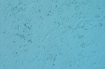 Blue plaster wall texture. Empty plaster background