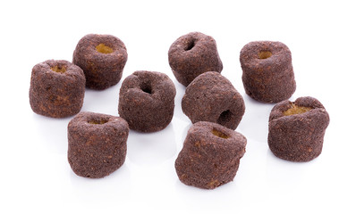 Crunchy corn chocolate snacks on a white background