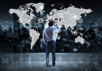 Businessman watching digital planet earth interface on a rooftop 3D rendering