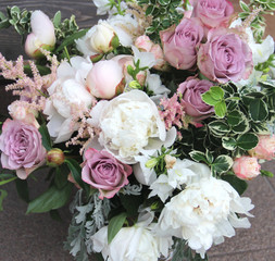 Beautiful wedding bouquet with a lot of tender flowers