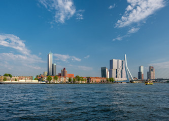 Fototapeta premium Rotterdam city cityscape skyline with Erasmus bridge and river. South Holland, Netherlands.