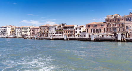 Fototapeta premium Venice, Veneto / Italy- May 20, 2017: View of the shore with the street called 
