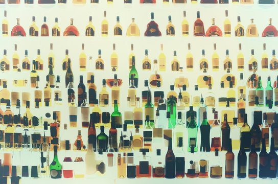 Various alcohol bottles in a bar, toned image