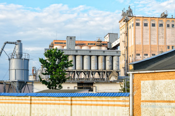 Plant for the production of baked goods. Elements of the facade of the production building. Factory background